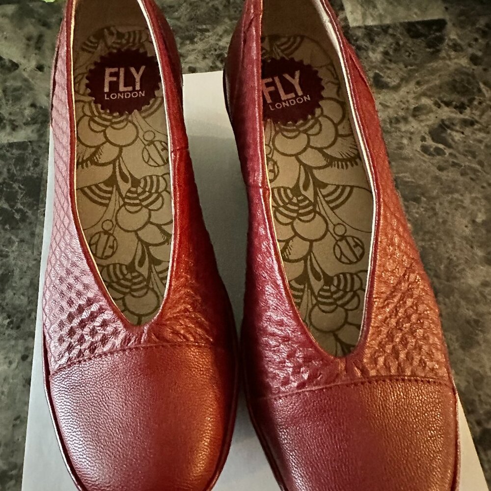 London Fly Red Leather Shoes with rubber type 2.5 inch sole.  Never worn